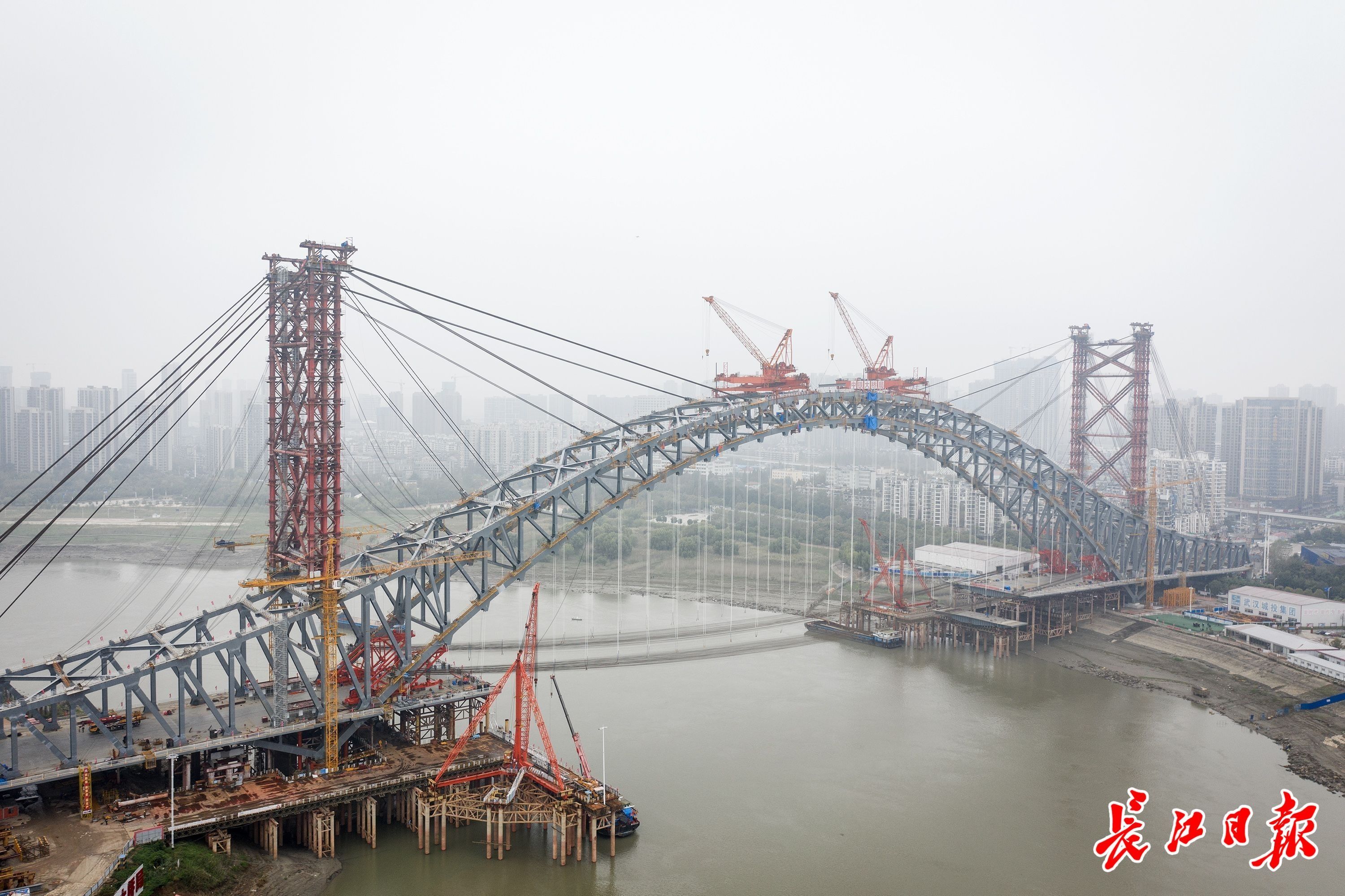 一拱飞跃汉江古田四路玉龙路成功牵手汉江湾桥26日合龙