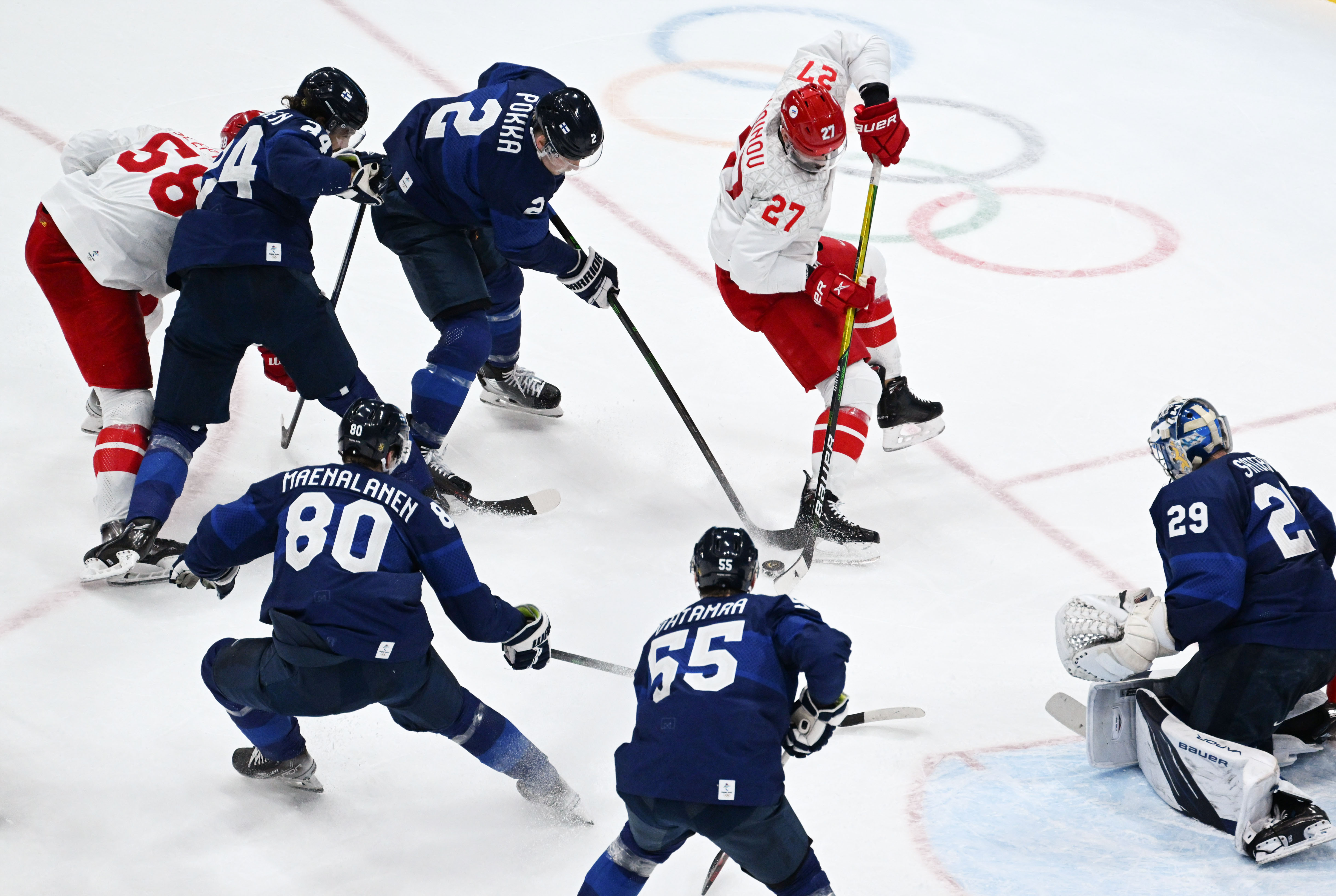 北京冬奥会冰球挑落卫冕冠军芬兰首夺冬奥会男子冰球金牌
