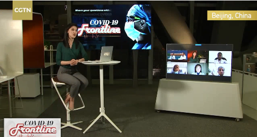 cgtn主持人焦旸在北京演播室主持"全球疫情会诊室"如何判断和治疗