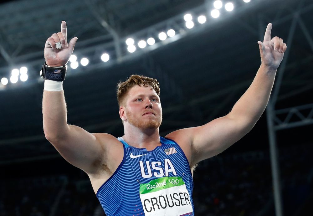图为2016年8月18日,美国选手瑞安·克劳瑟在2016年里约奥运会田径男子
