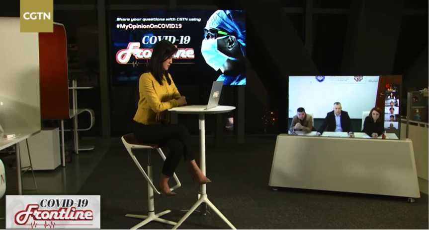cgtn主持人焦旸在北京演播室中主持"全球疫情会诊室"他补充说,最近