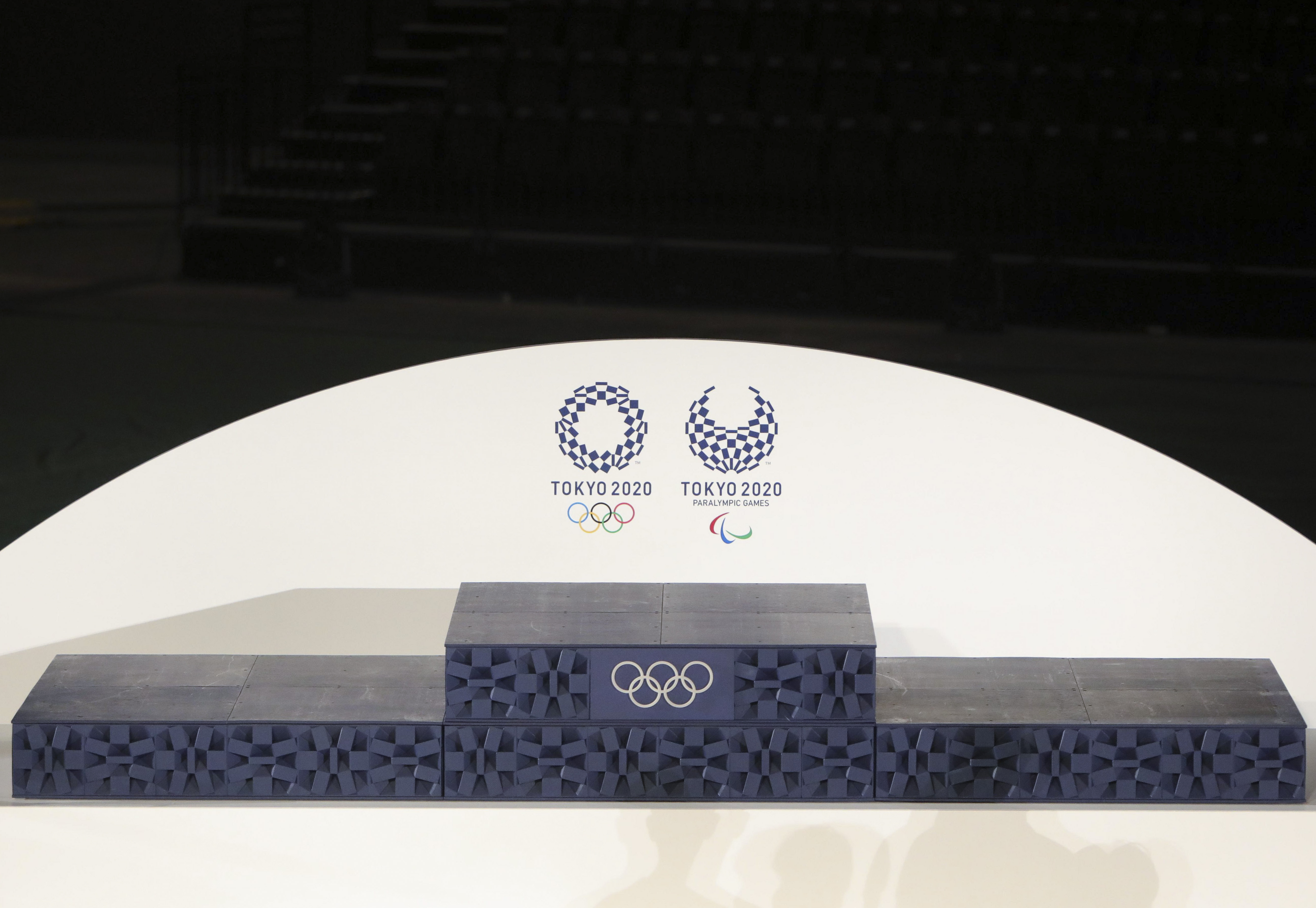 图为东京奥运会倒计时50天时发布的颁奖台造型.